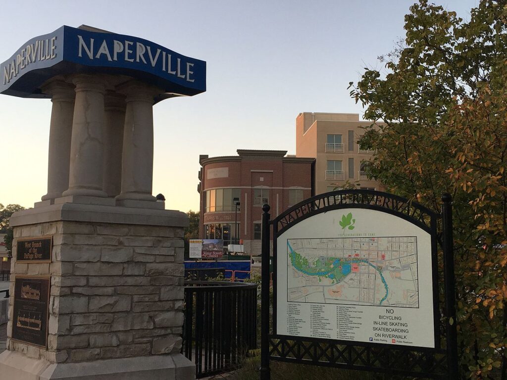 Naperville city sign and Riverwalk map – representing local businesses served by Managed IT Services in Naperville.